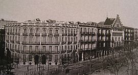 terrace of uniform houses broken only by the pointed roof of the Casa Amatller