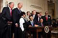 Obama signs health care-20100323