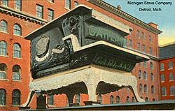 Color photograph of the World's Largest Stove outside the Michigan Stove Factory