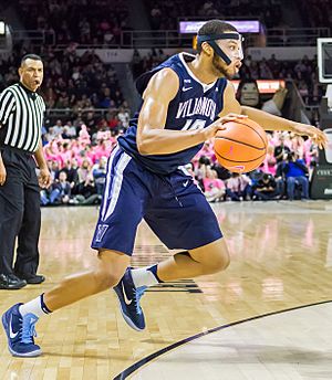 Omari Spellman with mask.jpg