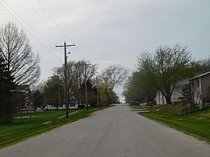 The village of Raritan along its main street, 400 N in April 2017