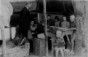 StateLibQld 2 149763 Teacher and class at a bush school, 1910-1914