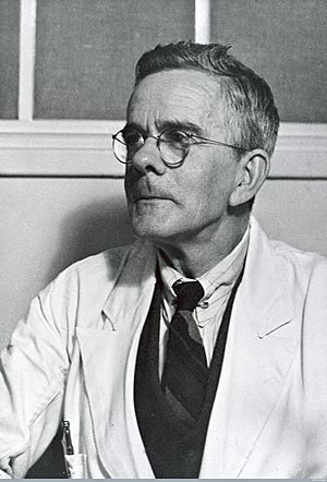 Alexander Thomas Glenny in his lab coat.jpg