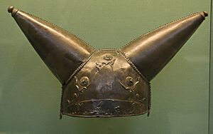 Bronze helmet with two conical horns