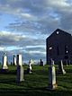 View of the St. Raphael's ruins and surrounding gravestones