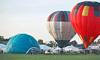 Filling balloons with hot air