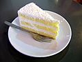 A slice of coconut cake