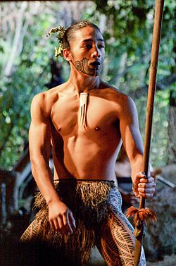 Young Maori man dancing