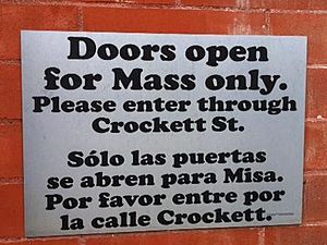 Bilingual sign at Dallas Cathedral